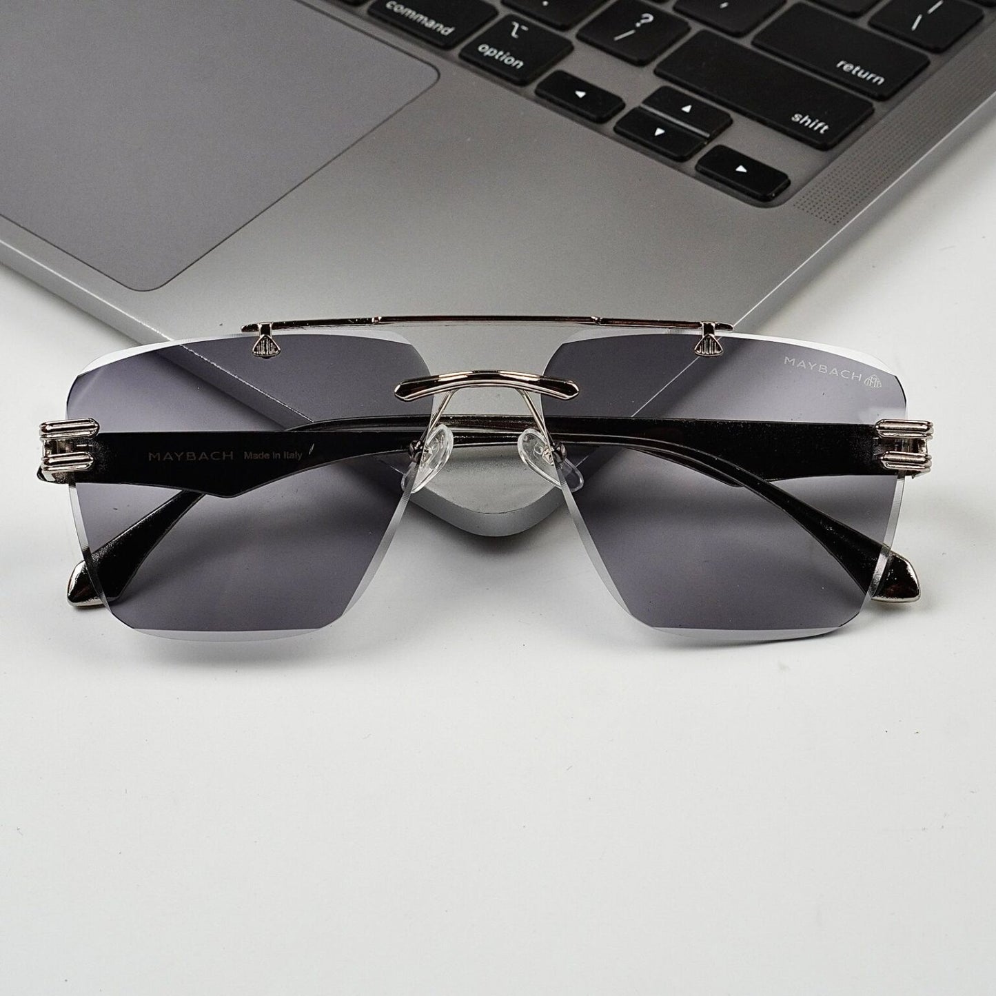RIMLESS TRANSITION BLACK SUNGLASSES